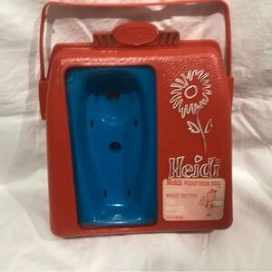 Vintage 1964 Remco Heidi carrying case for Pocketbook dolls. Pre-owned.